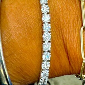 Lab created 10.4 carat white gold diamond tennis bracelet.